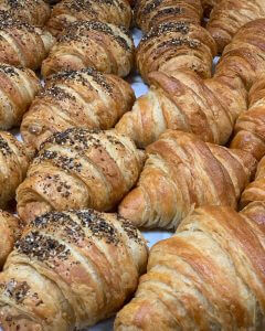 Plain croissants and croissants sprinkled with seeds