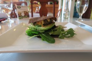 burger with avocado and veggies