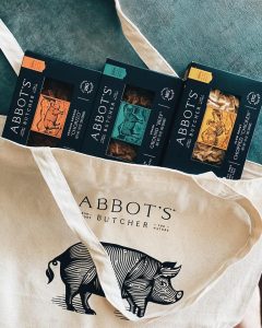 abbot's butcher vegan boxes of chorizo ground beef and chopped chicken on teal background with branded reusable cloth bag