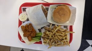 zonk burger food tray vegan burger buffalo wings fries vegan ranch