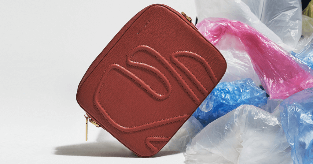 vegan leather handbag with plastic in background