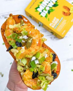 the Plant Based Seafood Co. shrimp stuffed squash on a bread with vegetables