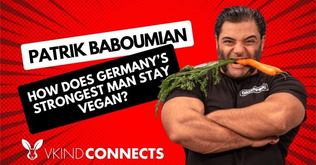 Patrik Baboumian with carrots in his mouth German strongman
