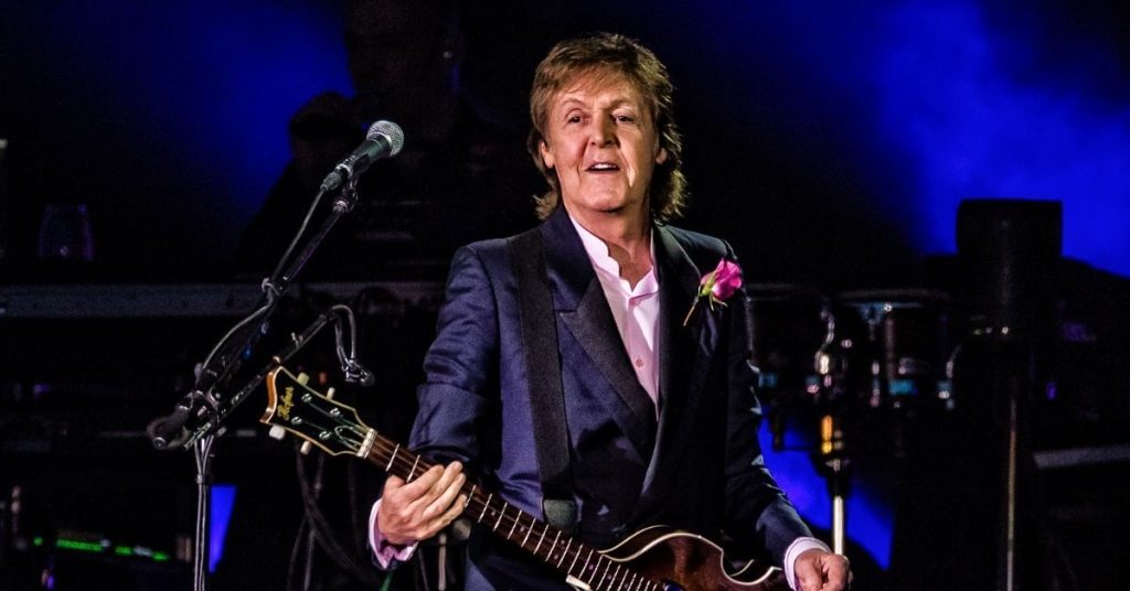 Paul McCartney playing guitar