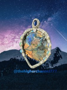 the higher channel 777 medallion with wolf impression and opals mountain backdrop stellar sky