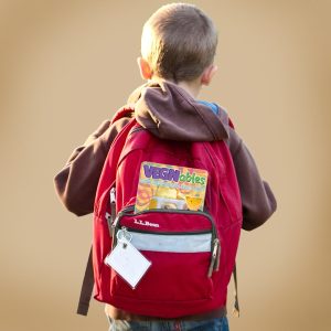 boy red backpack with vegnables snack pack