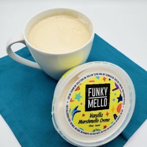 funky mello's vanilla marshmello creme ice cream next to a mug of coffee